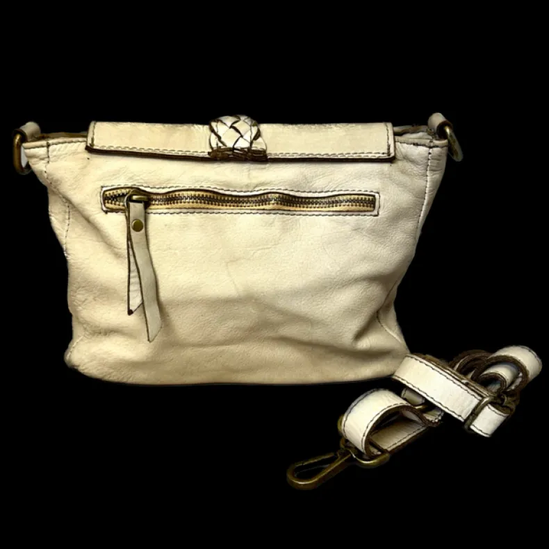 Handmade Bag In Washed Leather With Braid