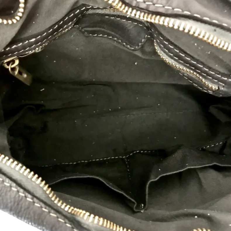 Handmade Bag In Washed Leather With Braided Handle